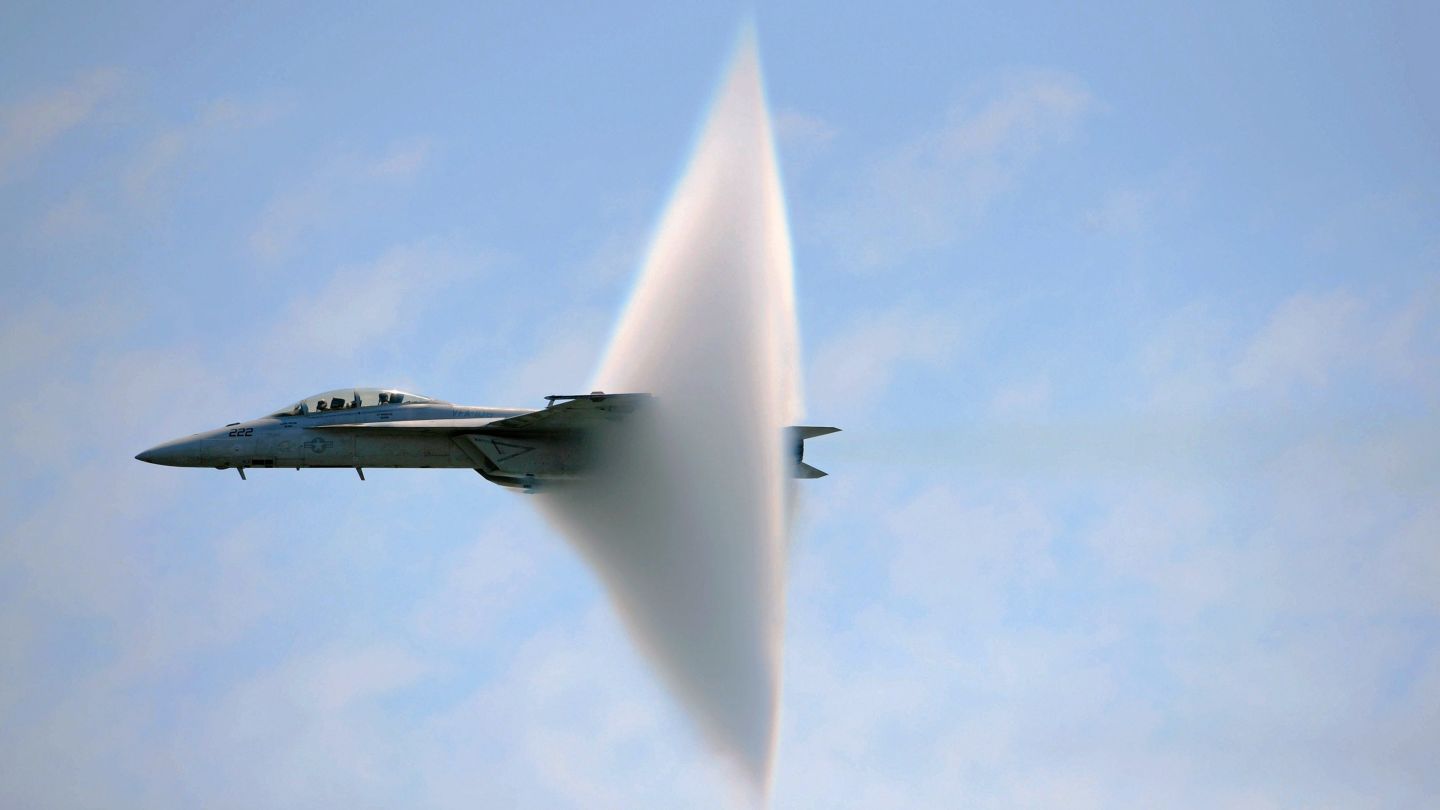 Airplaine breaking the sound barrier